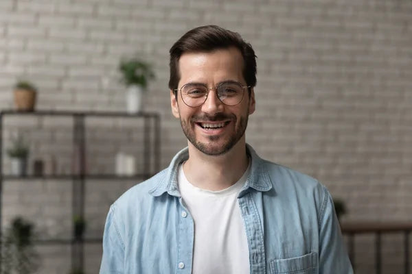 files/depositphotos_436429026-stock-photo-happy-young-man-posing-for.webp
